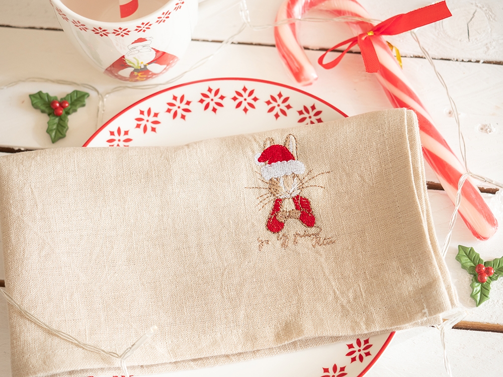 Serviette de table en lin lavé - Peter et le bonnet de Noël