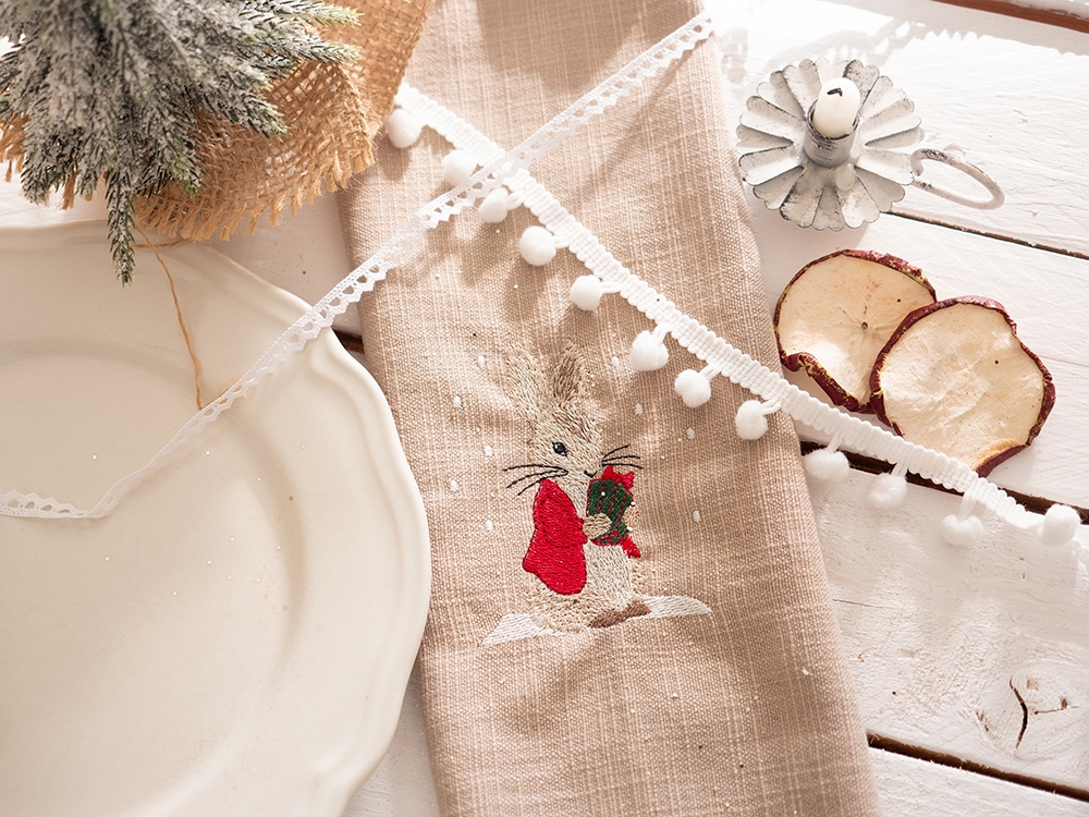Serviette de table en coton - Pierre et le cadeau de Noël
