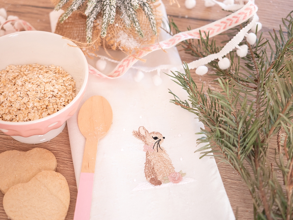 Serviette de table en coton - Elégante lapine dans la neige